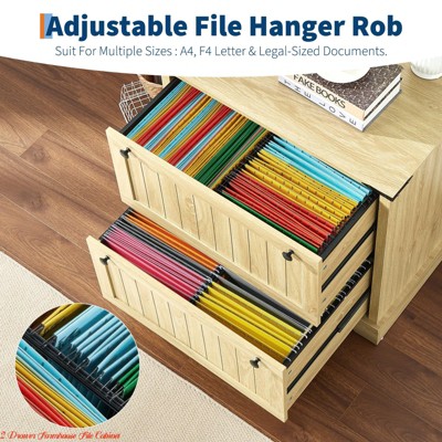 Open drawer showing multicolored hanging file folders inside a wooden cabinet