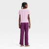Girls' Short Sleeve Graphic T-Shirt and Pants Pajama Set - Cat & Jack™ - 2 of 4