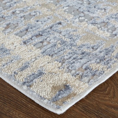 Laina 2' x 3' Blue and Tan Abstract Synthetic Area Rug