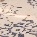 blue cushion/brown wicker