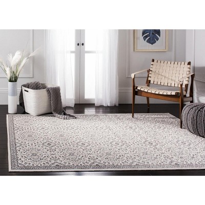 Elegant Gray 4' x 6' Synthetic Rectangular Easy-Care Area Rug