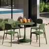 WestinTrends Playa 5-Piece Indoor Outdoor Metal Round Patio Dining Table Set With Stackable Resin Patio Side Chairs - 2 of 4