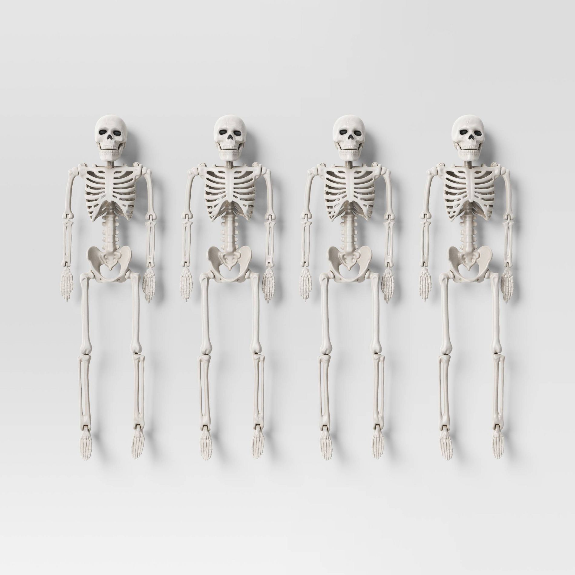 4pc 10" Skeletons Halloween Decorative Props - Hyde and EEK! Boutique™: Indoor/Outdoor, Off-White