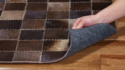 Handmade Brown and Beige Geometric Cowhide Area Rug