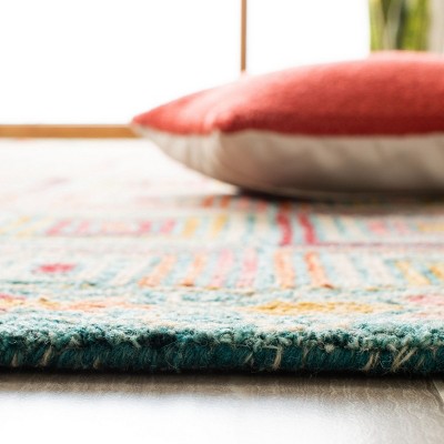 Handmade Red and Multicolor Wool Tufted Area Rug