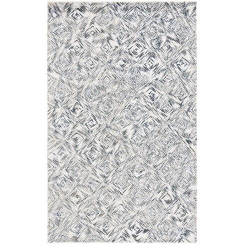 Soho SOH125 Hand Tufted Indoor Rug - Safavieh - image 1 of 4