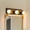 ALOADECOR Modern Integrated LED Bathroom Vanity Light in Black and Brass Finish with White Acrylic Shade Contemporary Adjustable Head Wall Sconce - 2 of 4