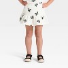Toddler Girls' 2pc Disney Minnie Mouse Short Sleeve Top and Skort Set - Ivory - 4 of 4