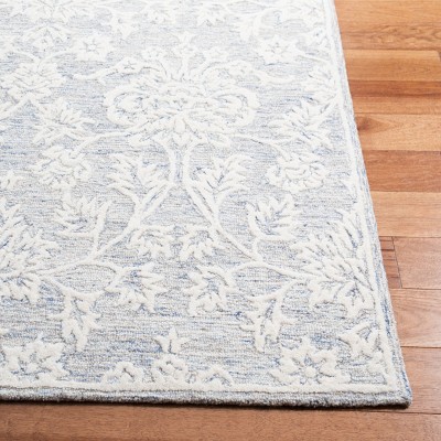 Blue and Ivory Hand-Tufted Wool 4' x 6' Area Rug