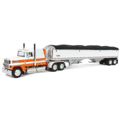 First Gear 1/64 Orange Ford LTL 9000 60" Flattop Wilson Pacesetter Grain Trailer DCP 60-1798