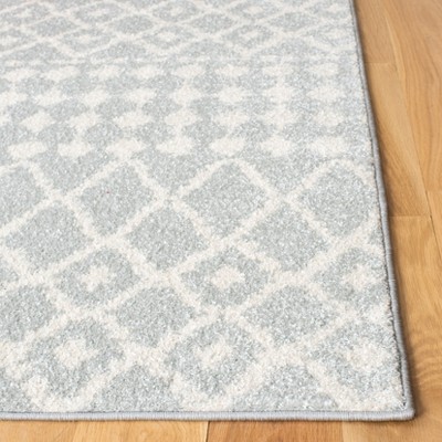 Light Grey and Cream Geometric 4' x 6' Synthetic Area Rug