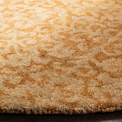 Hand-Tufted Gold and Beige Wool Oval Area Rug 7'6" x 9'6"