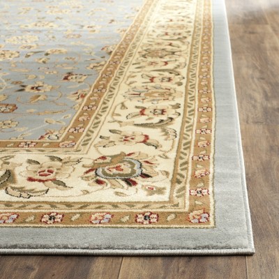 Lyndhurst Light Blue and Ivory Synthetic 10' x 14' Rectangular Area Rug