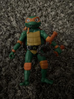 Prodotto: GPZ-TU800000.MICHELANGELO - TURTLES MOVIE 23 TARTARUGHE NINJA  SHOUTS ACTION FIGURE DELUXE MICHELANGELO CON SUONI 15,5 CM - GIOCHI PREZIOSI