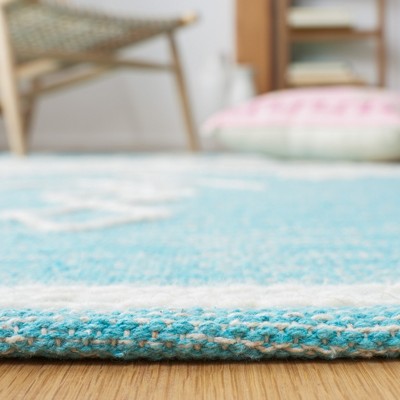 Teal and Ivory Wool Flatweave Tribal Area Rug, 5' x 8'