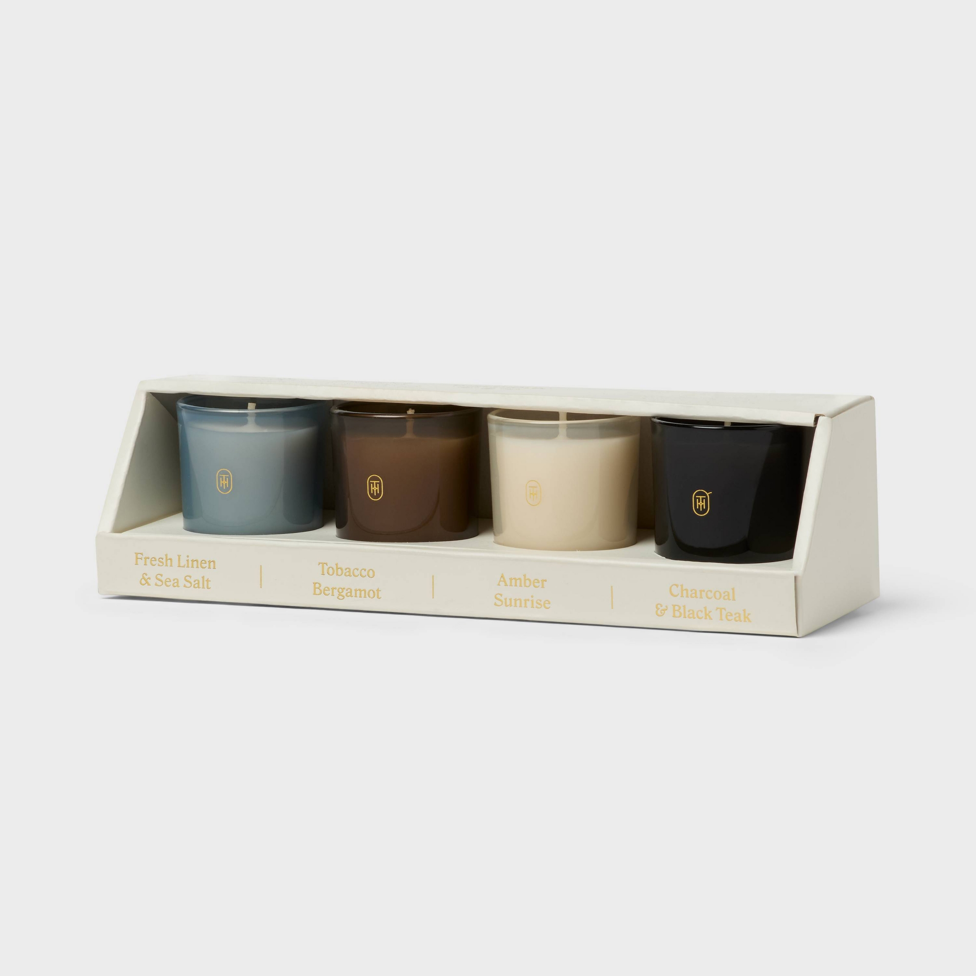 4pk Glass Votive Charcoal Black Teak/Tobacco Bergamot/Rainwater Lily/Amber Sunrise Jar Candle Set - Threshold™