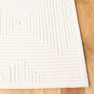 Ivory Geometric Handmade Wool Round Tufted Rug