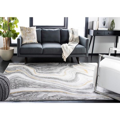 Grey and Gold Abstract 4' x 6' Stain-Resistant Synthetic Rug