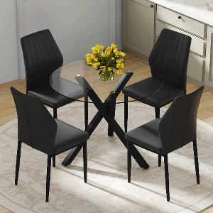 Lyngins Modern Round Glass Dining Table Set – Transparent Top with X-Shaped Black Metal Base & 4 PU Chairs with a Vertical Stripe Design - 1 of 4