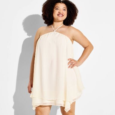 cream flowy mini dress Laurie Cream Button Down Mini Dress Medium | Women's Online Boutique | Boho Chic Style