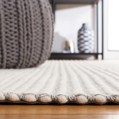 Ivory and Grey Handwoven Wool 6' x 9' Area Rug