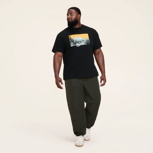 Adult National Parks Graphic Print Short Sleeve Crewneck T-Shirt - Woolrich x Target Black - 1 of 4