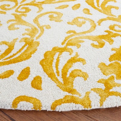 Ivory and Gold Hand-Tufted Round Wool Area Rug