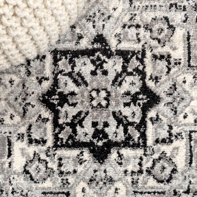 4' x 6' Dark Gray and Cream Medallion Synthetic Area Rug