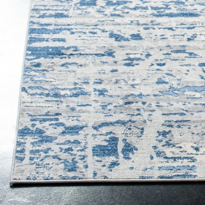 Abstract Ivory/Blue Synthetic 4' x 6' Hand-Knotted Area Rug