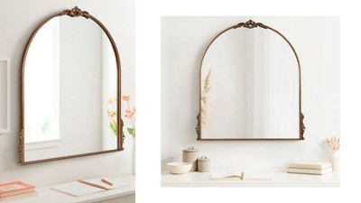 Myrcelle Antique Black Arched Wall Mirror with Ornate Garland Details