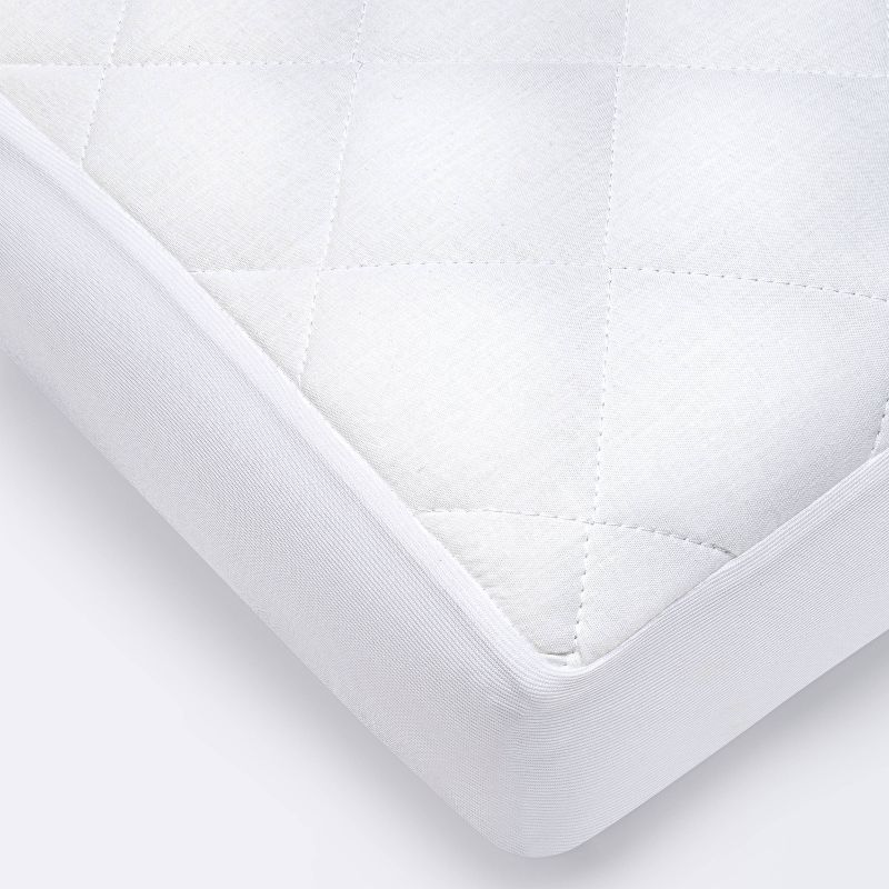 Waterproof Fitted Crib and Toddler Mattress Pad Cover - Cloud Island&#8482; White, 1 of 5
