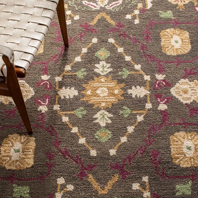 Handmade Ivory and Sage Wool Tufted Area Rug 6' x 9'