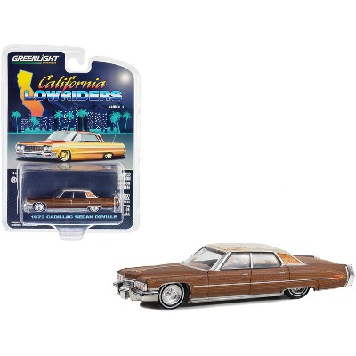 1973 Cadillac Sedan DeVille Dark Brown Metallic with Light Brown Pinstripes and White Top 1/64 Diecast Model Car by Greenlight