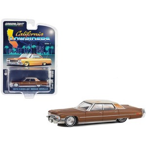 1973 Cadillac Sedan DeVille Dark Brown Metallic with Light Brown Pinstripes and White Top 1/64 Diecast Model Car by Greenlight - 1 of 3