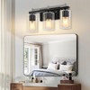 DAKAFUL Modern Bathroom Vanity Light, Vanity Fixture with Black+Gold/Silver Frame&Clear Glass Shade, Wall Light for Mirror, Bedroom, Bathtub Area - 3 of 4