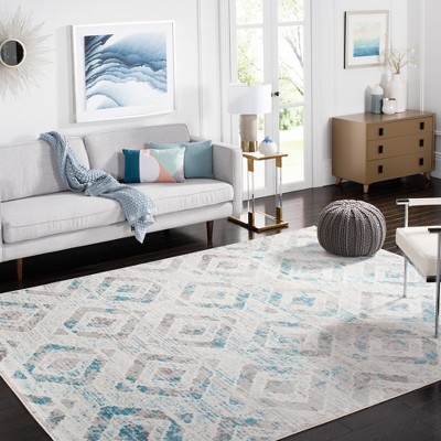 Ivory and Blue Medallion 6' x 9' Synthetic Area Rug