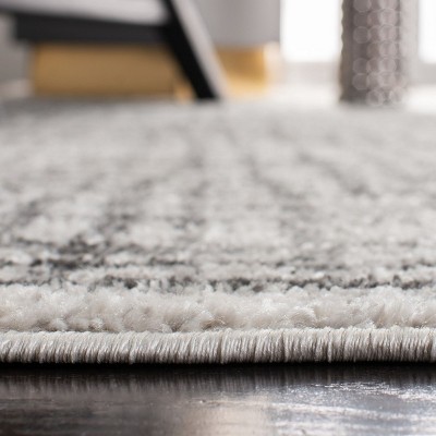 Ivory and Silver Rectangular Synthetic Area Rug, 6' x 9'