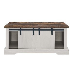 Dexmalle 41.3” Rustic  Coffee Table with Storage and Sliding Doors - 1 of 4