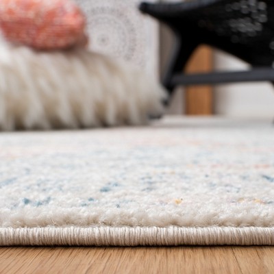 Ivory and Terracotta Round Synthetic Geometric Area Rug