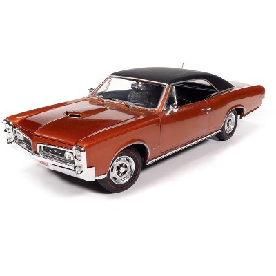1966 Pontiac GTO Copper Blaze Metallic with Black Vinyl Top 1/18 Diecast Model Car by Auto World