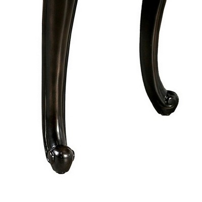 Close-up of the curled foot of the end table leg