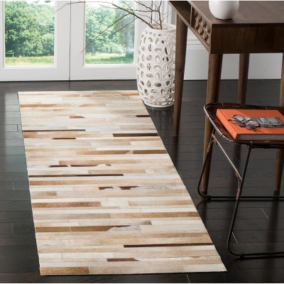 Handmade Ivory Geometric Cowhide Area Rug 27" x 9"