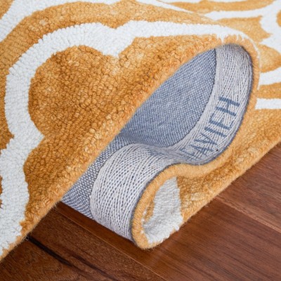 Ivory and Gold Hand-Tufted Wool 6' x 9' Rectangular Rug