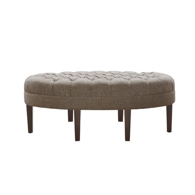 Beige Tufted Oval Ottoman with Dark Wood Legs