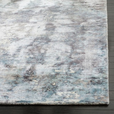 Ivory and Blue Hand-Knotted Viscose Area Rug, 6' x 9'