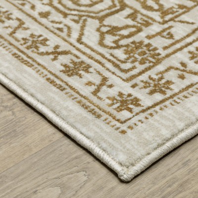 Handmade Ivory and Gold Synthetic Rectangular Area Rug 5'3" x 7'6"