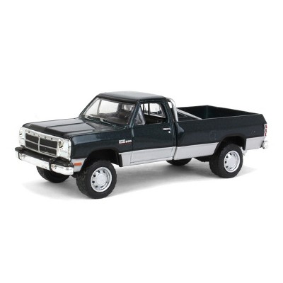 Greenlight Collectibles 1/64 1992 Dodge Ram 1st Generation Green & Silver Lifted Pickup Truck Outback Toys Exclusive 51385-A