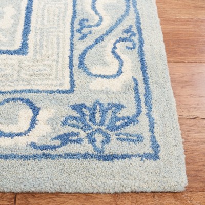 Ivory and Light Blue Hand Tufted Wool Area Rug