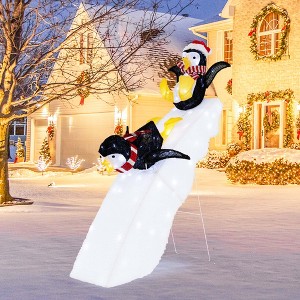 Costway 4FT Pre-Lit Christmas Penguin Ice Skating Decoration with Snowy Slide & LED Lights - 1 of 4