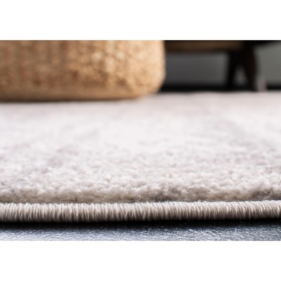 Ivory and Silver 6' x 6' Square Synthetic Area Rug